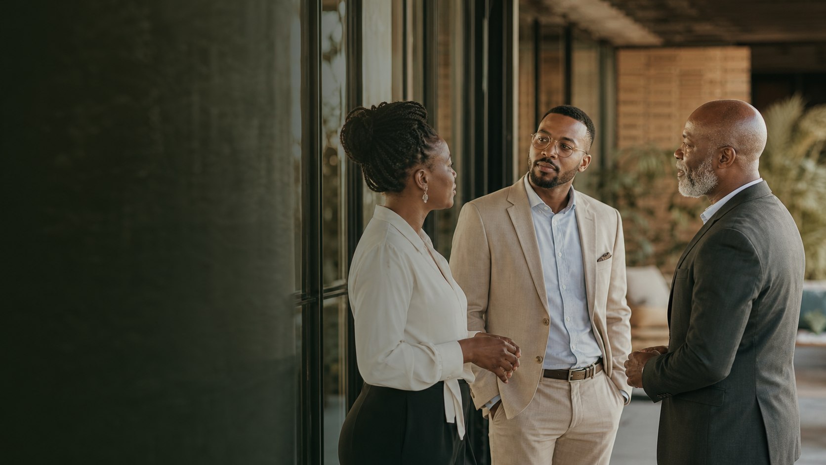 Maputo Publicidade team members in conversation